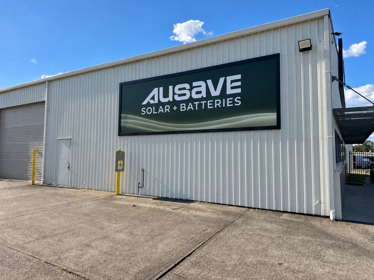 Side of the Ausave premises with the building signage
