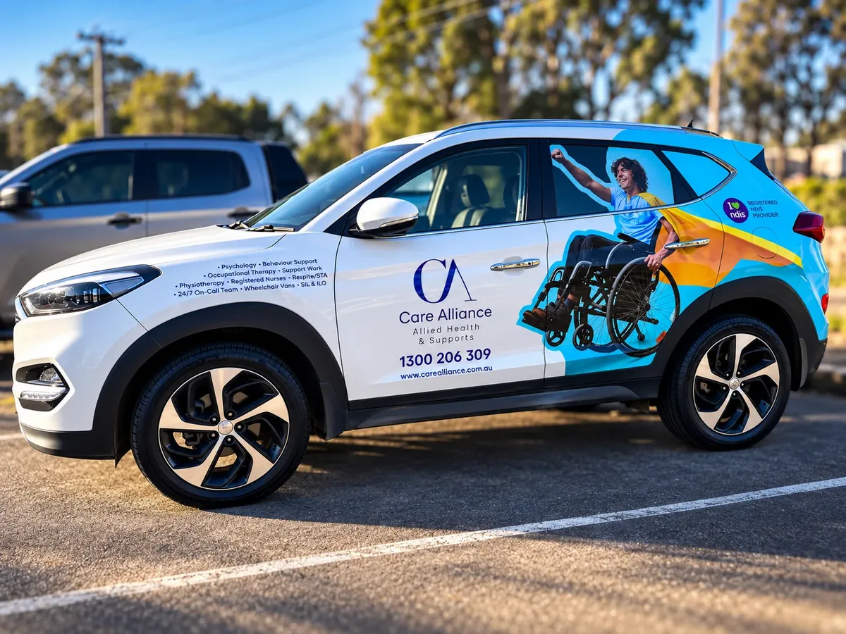 Care Alliance vehicle wrapped by Big Colour in white and blue, with Allied Health and Supports branding and the service list along the side