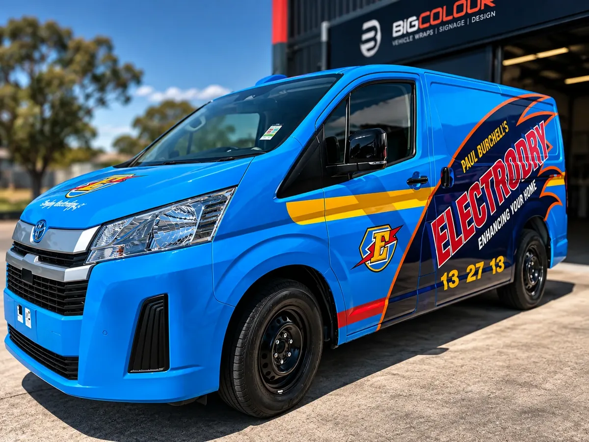A single blue Paul Burchells Electrodry van in a full wrap with the roof included, outside the Big Colour workshop