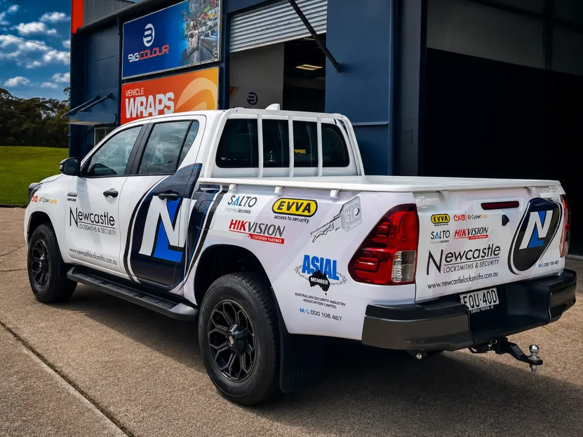 Newcastle Locksmiths & Security ute branded with printed door and body graphics