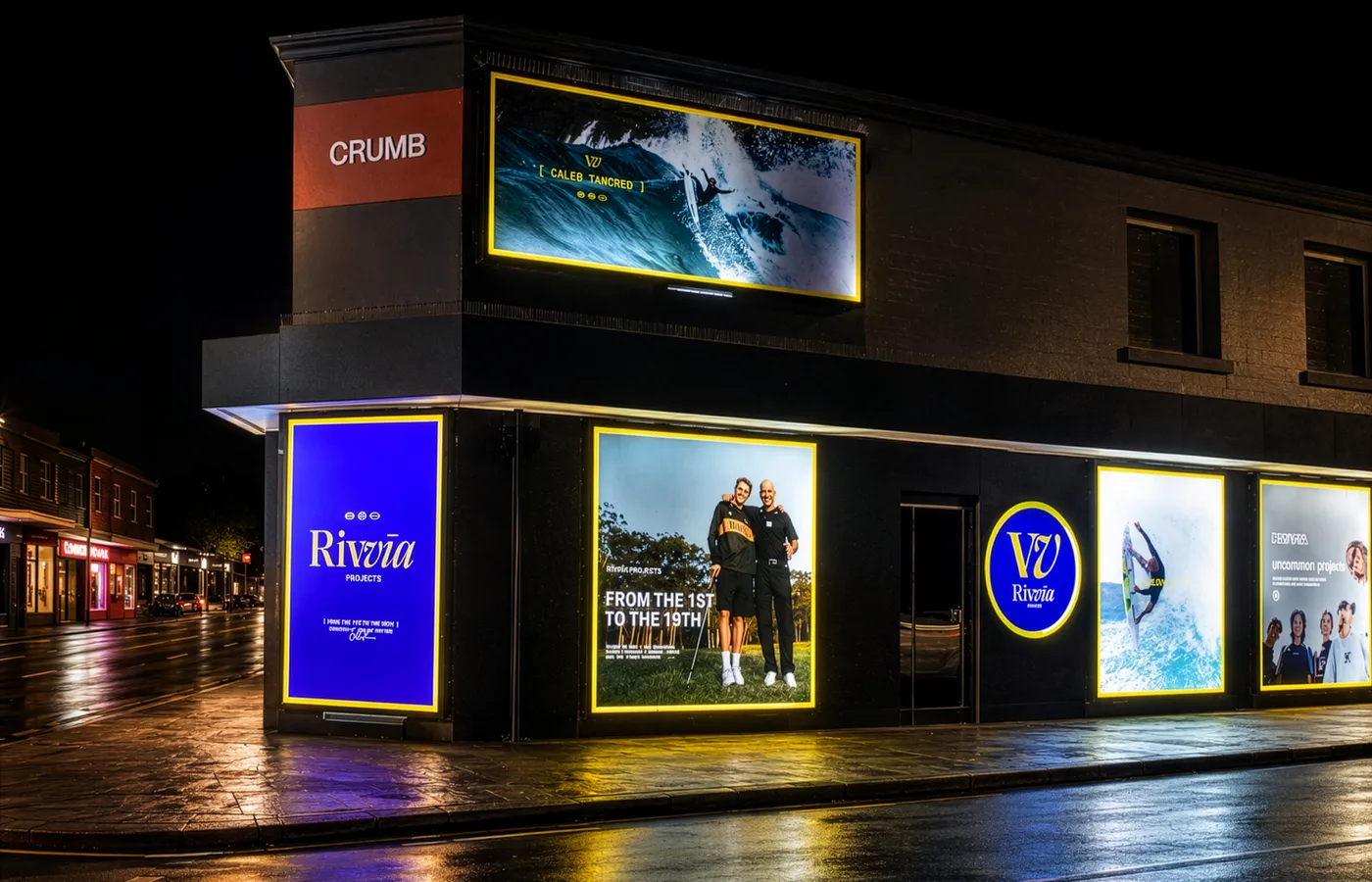 Illuminated shopfront signage at night