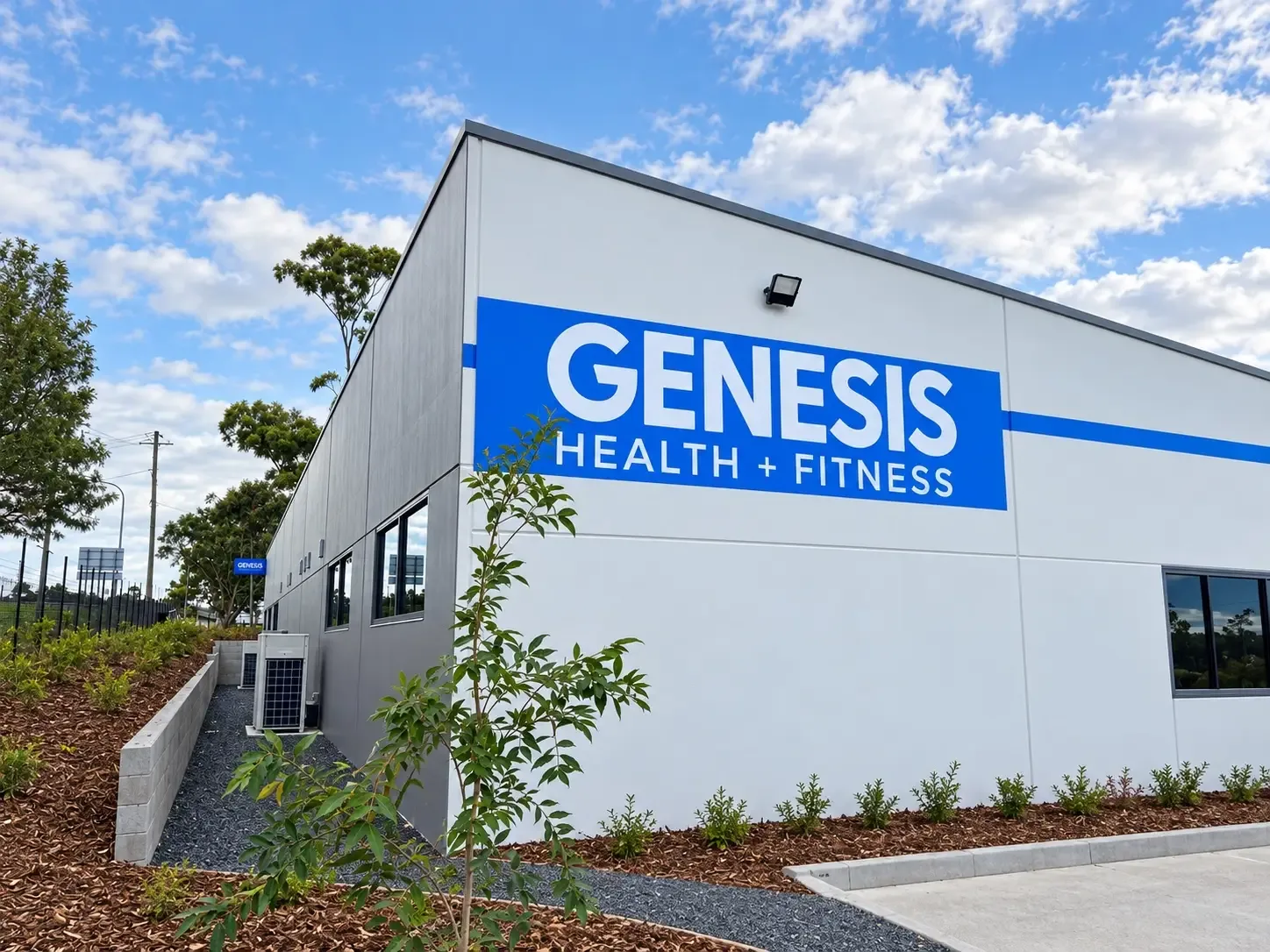 Genesis Health + Fitness building in Thornton with blue and white signage