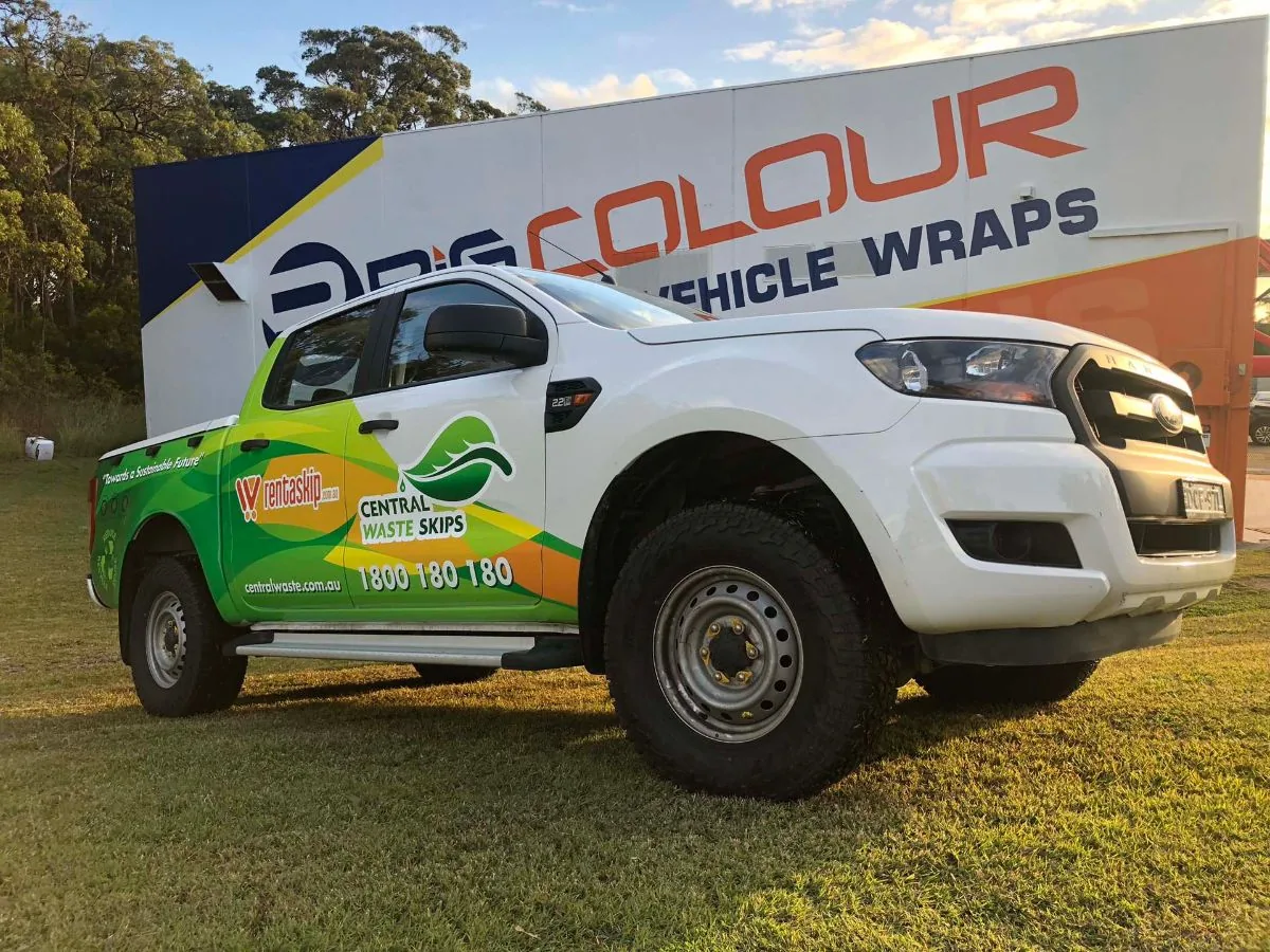 Central Waste Skips ute wrapped by Big Colour, in front of the Big Colour Vehicle Wraps sign
