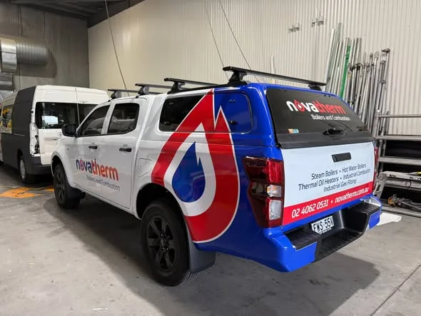 Novatherm canopy ute with the red droplet livery wrapping the rear canopy