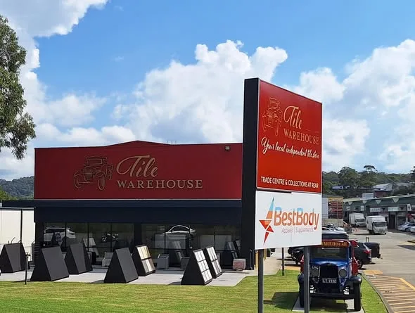 Tile Warehouse pylon sign on the road frontage
