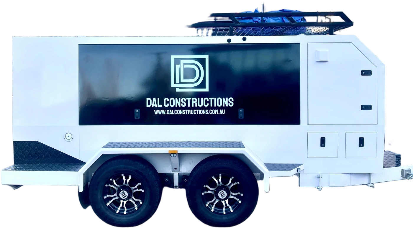 DAL Constructions enclosed trailer with black panel signage