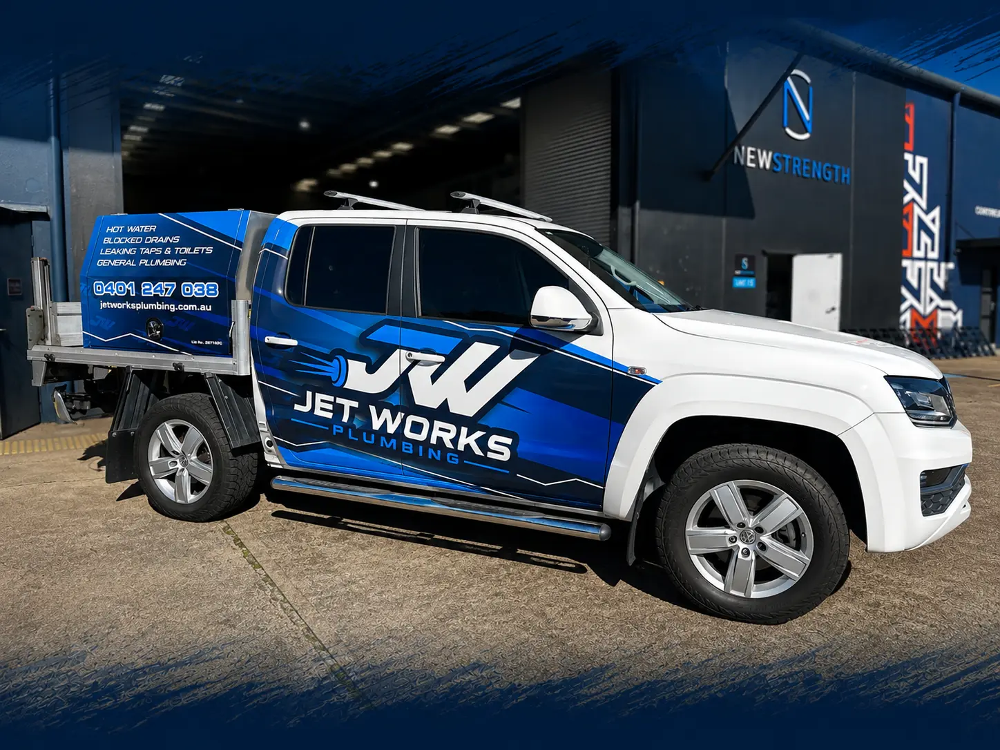 Jet Works Plumbing ute wrapped by Big Colour, with company branding and contact details on the side