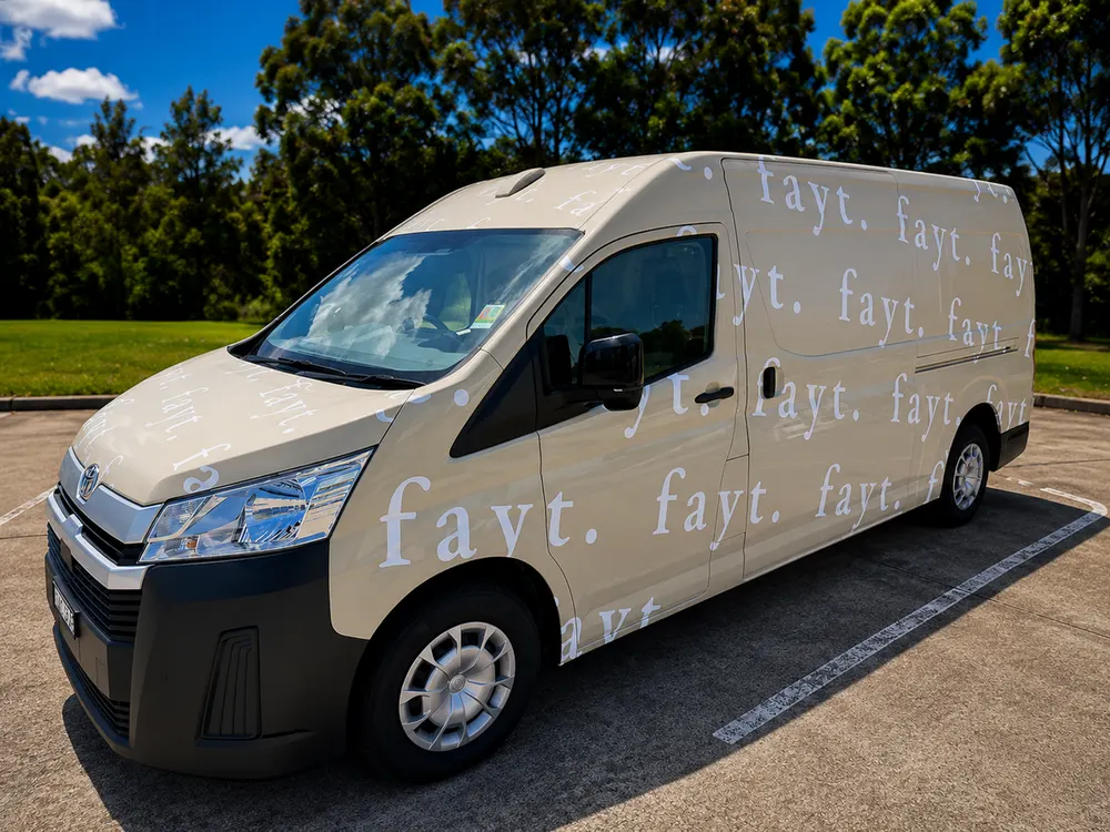 FAYT The Label van wrap with repeating logo panels