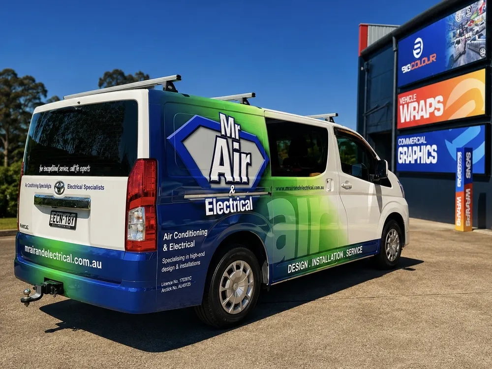 Mr Air and Electrical Toyota van in a blue, green and white full wrap
