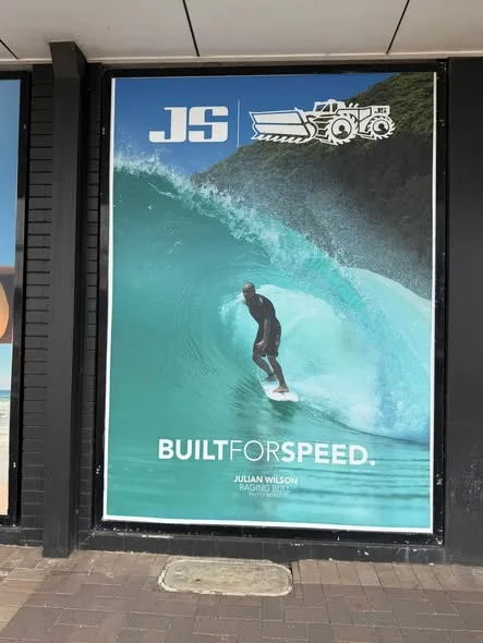 Freshly printed surf-graphic skins in the Sanbah Surf window lightboxes