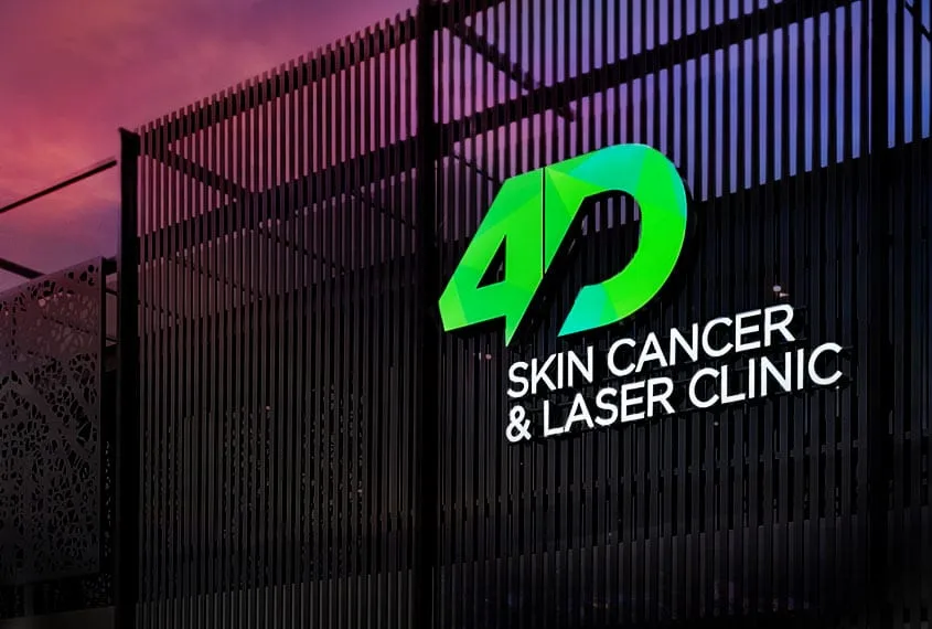 4D Skin Clinic illuminated sign at dusk