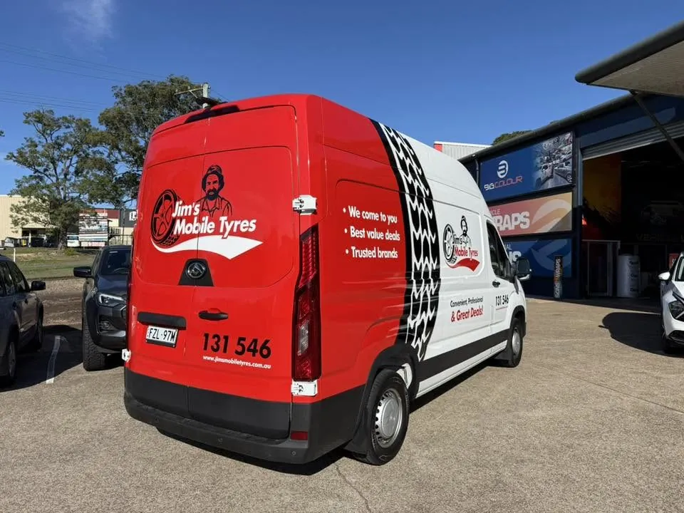 Jim's Mobile Tyres van with tyre-tread rear graphic