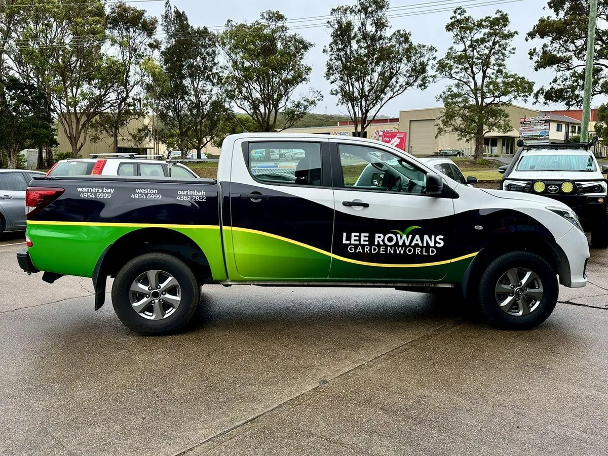 Lee Rowans Gardenworld Hilux ute in the green-fade livery