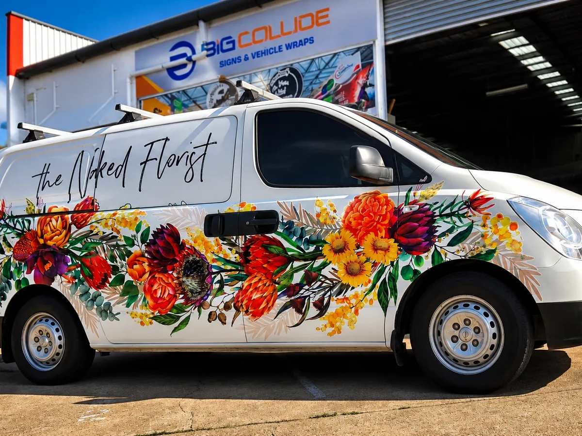 The Naked Florist white van with the colourful native flower wrap