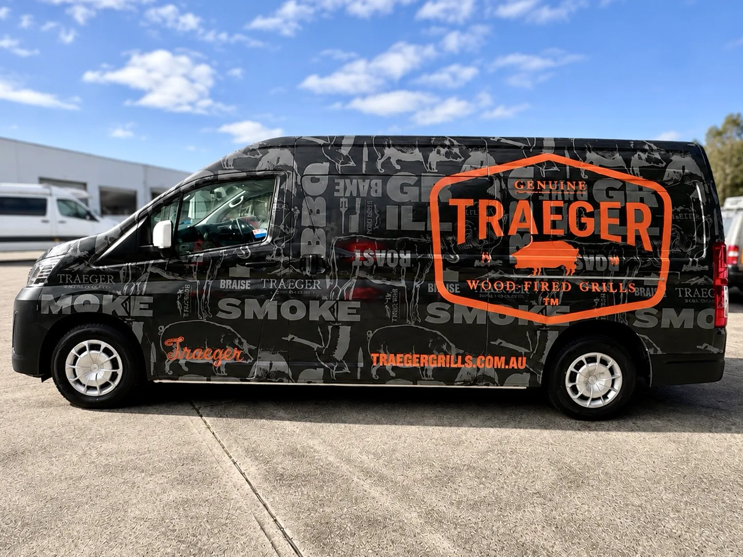 Traeger wood fired grills black van with orange logo wrapped by Big Colour