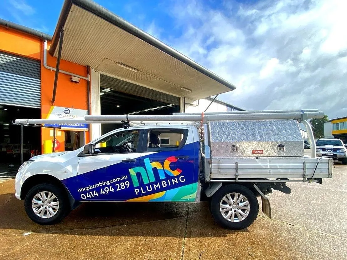 NHC Plumbing ute signage